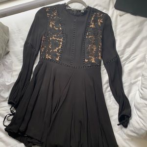 Black fit and flare dress with lace accent